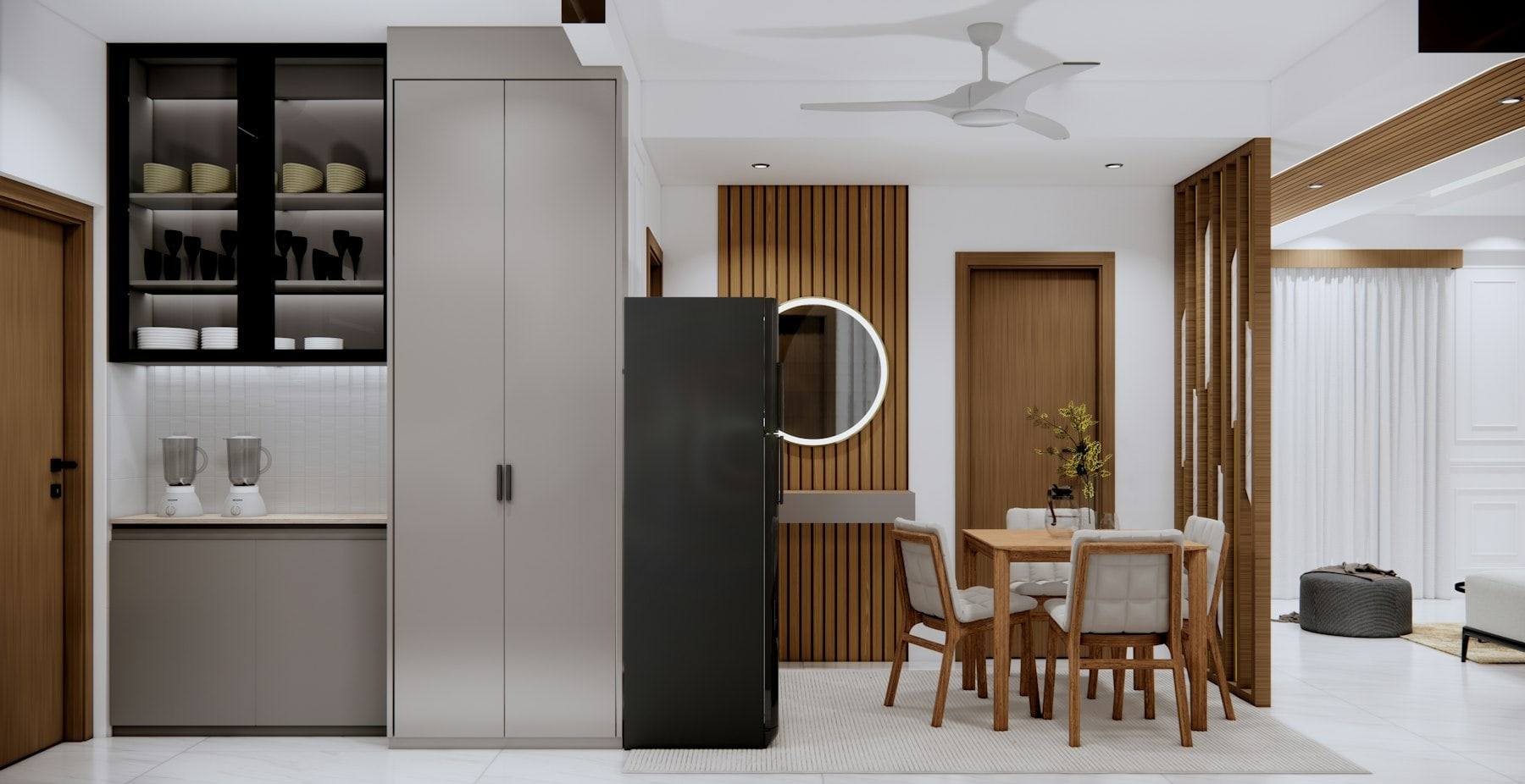 A compact flat with a tall kitchen unit and a small dining table